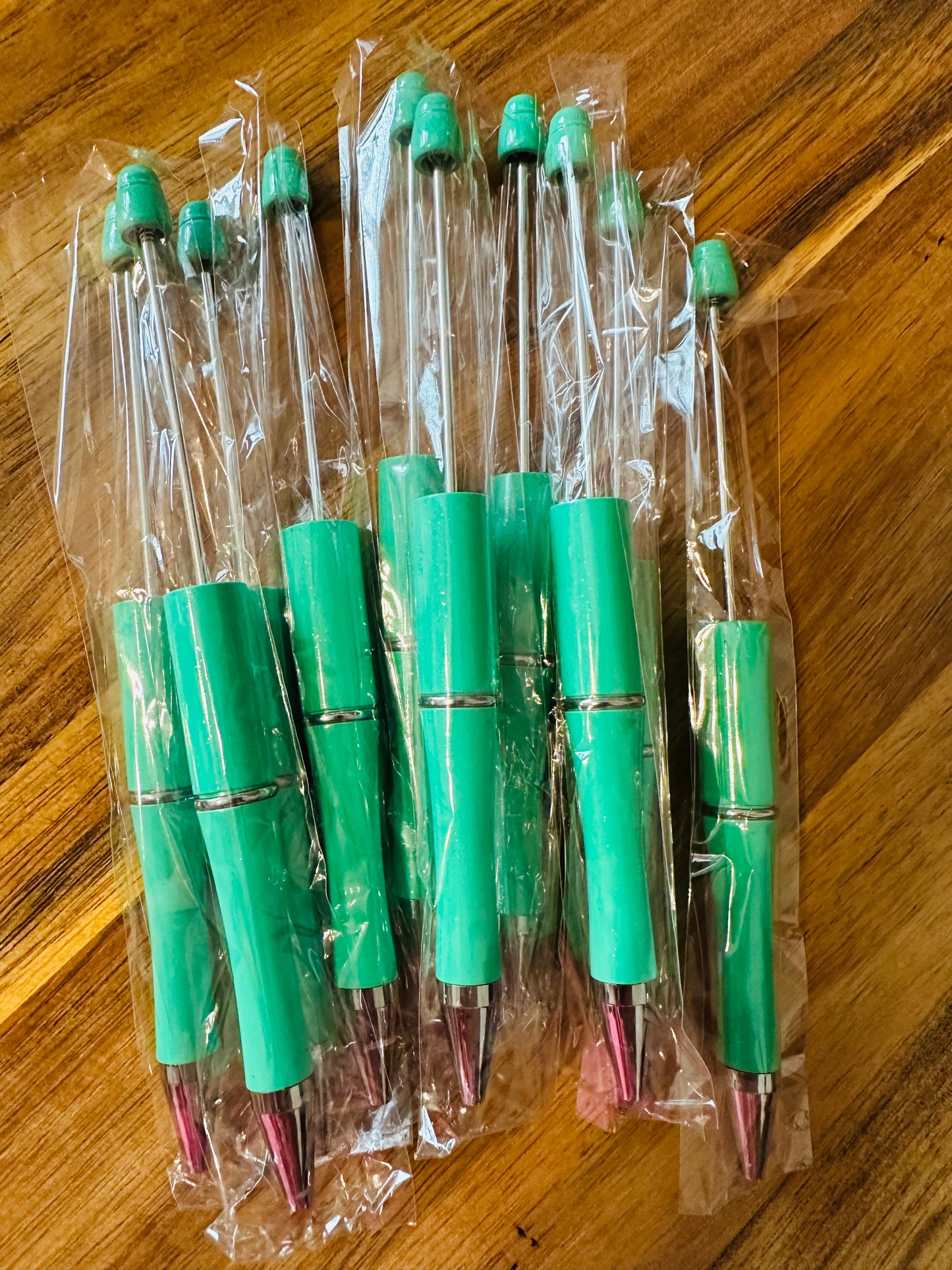 Teal plastic pens (wholesale)